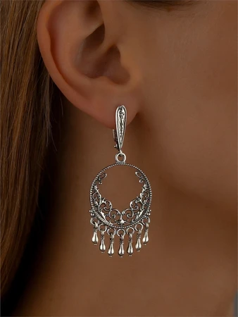 {{productViewItem.photos[photoViewList.activeNavIndex].Alt || productViewItem.photos[photoViewList.activeNavIndex].Description || 'Серьги из серебра'}}