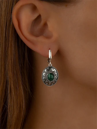 {{productViewItem.photos[photoViewList.activeNavIndex].Alt || productViewItem.photos[photoViewList.activeNavIndex].Description || 'Серьги из серебра с малахитом'}}