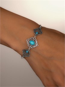 {{photo.Alt || photo.Description || 'Браслет из серебра с бирюзой'}}