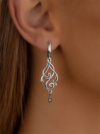 {{productViewItem.photos[photoViewList.activeNavIndex].Alt || productViewItem.photos[photoViewList.activeNavIndex].Description || 'Серьги из серебра'}}