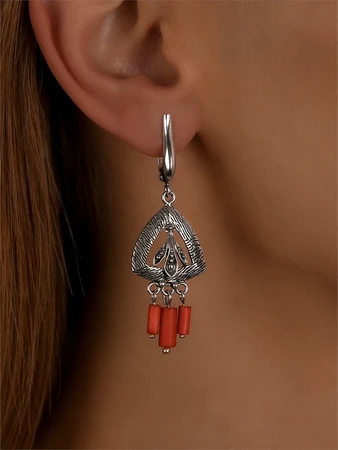 {{productViewItem.photos[photoViewList.activeNavIndex].Alt || productViewItem.photos[photoViewList.activeNavIndex].Description || 'Серьги из серебра с кораллом'}}