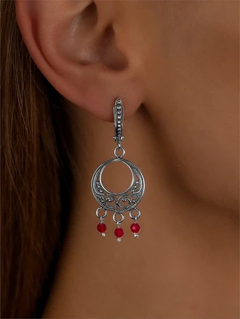 {{productViewItem.photos[photoViewList.activeNavIndex].Alt || productViewItem.photos[photoViewList.activeNavIndex].Description || 'Серьги из серебра с корундом'}}