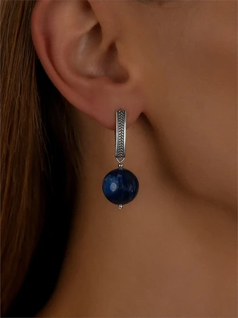 {{productViewItem.photos[photoViewList.activeNavIndex].Alt || productViewItem.photos[photoViewList.activeNavIndex].Description || 'Серьги из серебра с кианитом'}}