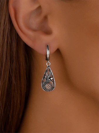 {{productViewItem.photos[photoViewList.activeNavIndex].Alt || productViewItem.photos[photoViewList.activeNavIndex].Description || 'Серьги из серебра'}}