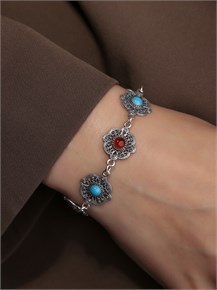 {{photo.Alt || photo.Description || 'Браслет из серебра с бирюзой и сердоликом'}}