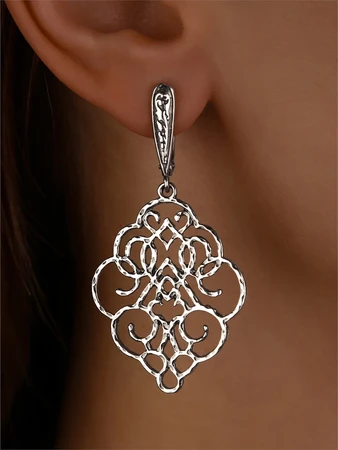 {{productViewItem.photos[photoViewList.activeNavIndex].Alt || productViewItem.photos[photoViewList.activeNavIndex].Description || 'Серьги из серебра'}}