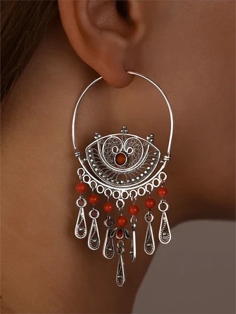 {{productViewItem.photos[photoViewList.activeNavIndex].Alt || productViewItem.photos[photoViewList.activeNavIndex].Description || 'Серьги из серебра с кораллом'}}