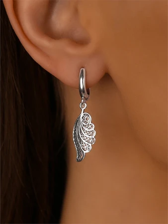 {{productViewItem.photos[photoViewList.activeNavIndex].Alt || productViewItem.photos[photoViewList.activeNavIndex].Description || 'Серьги из серебра'}}