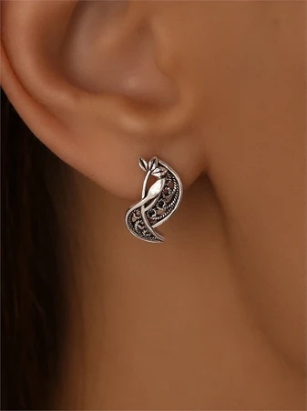{{productViewItem.photos[photoViewList.activeNavIndex].Alt || productViewItem.photos[photoViewList.activeNavIndex].Description || 'Серьги из серебра'}}