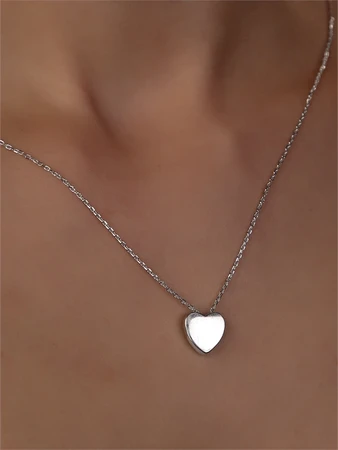 {{productViewItem.photos[photoViewList.activeNavIndex].Alt || productViewItem.photos[photoViewList.activeNavIndex].Description || 'Колье из серебра "Сердце"'}}