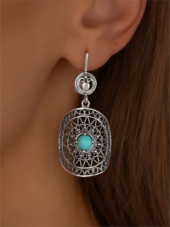 {{productViewItem.photos[photoViewList.activeNavIndex].Alt || productViewItem.photos[photoViewList.activeNavIndex].Description || 'Серьги из серебра с бирюзой'}}