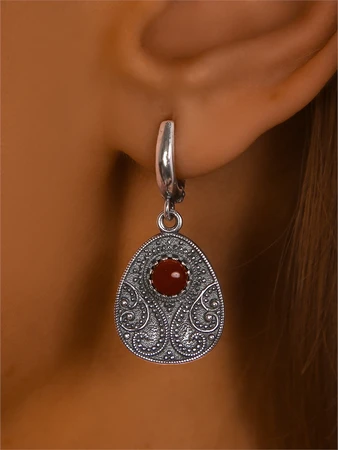 {{productViewItem.photos[photoViewList.activeNavIndex].Alt || productViewItem.photos[photoViewList.activeNavIndex].Description || 'Серьги из серебра с сердоликом'}}