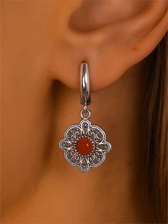 {{productViewItem.photos[photoViewList.activeNavIndex].Alt || productViewItem.photos[photoViewList.activeNavIndex].Description || 'Серьги из серебра с сердоликом'}}