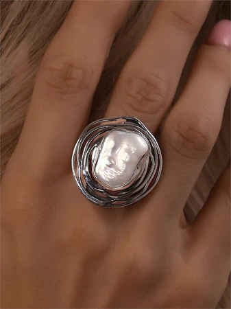 {{productViewItem.photos[photoViewList.activeNavIndex].Alt || productViewItem.photos[photoViewList.activeNavIndex].Description || 'Кольцо из серебра с жемчугом'}}