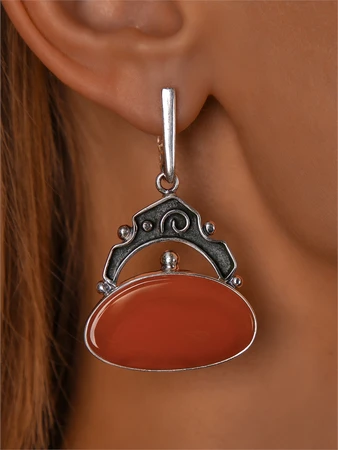 {{productViewItem.photos[photoViewList.activeNavIndex].Alt || productViewItem.photos[photoViewList.activeNavIndex].Description || 'Серьги из серебра с сердоликом'}}