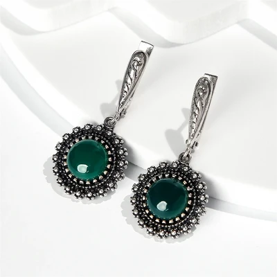 {{productViewItem.photos[photoViewList.activeNavIndex].Alt || productViewItem.photos[photoViewList.activeNavIndex].Description || 'Серьги из серебра с хризопразом'}}