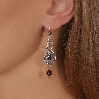{{productViewItem.photos[photoViewList.activeNavIndex].Alt || productViewItem.photos[photoViewList.activeNavIndex].Description || 'Серьги из серебра с аметистом'}}