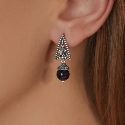 {{productViewItem.photos[photoViewList.activeNavIndex].Alt || productViewItem.photos[photoViewList.activeNavIndex].Description || 'Серьги из серебра с аметистом'}}