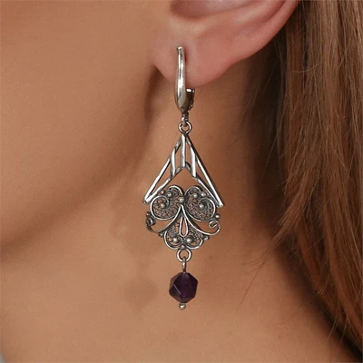 {{productViewItem.photos[photoViewList.activeNavIndex].Alt || productViewItem.photos[photoViewList.activeNavIndex].Description || 'Серьги из серебра с аметистом'}}
