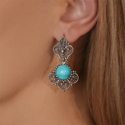 {{productViewItem.photos[photoViewList.activeNavIndex].Alt || productViewItem.photos[photoViewList.activeNavIndex].Description || 'Серьги из серебра с бирюзой'}}