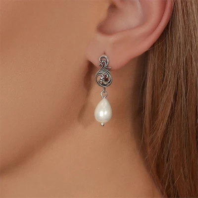 {{productViewItem.photos[photoViewList.activeNavIndex].Alt || productViewItem.photos[photoViewList.activeNavIndex].Description || 'Серьги из серебра с барочным жемчугом'}}