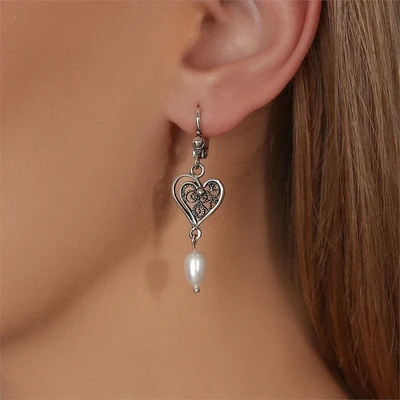 {{productViewItem.photos[photoViewList.activeNavIndex].Alt || productViewItem.photos[photoViewList.activeNavIndex].Description || 'Серьги из серебра с жемчугом'}}