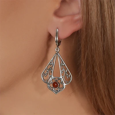 {{productViewItem.photos[photoViewList.activeNavIndex].Alt || productViewItem.photos[photoViewList.activeNavIndex].Description || 'Серьги из серебра с сердоликом'}}