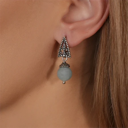 {{productViewItem.photos[photoViewList.activeNavIndex].Alt || productViewItem.photos[photoViewList.activeNavIndex].Description || 'Серьги из серебра с аквамарином'}}