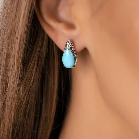 {{productViewItem.photos[photoViewList.activeNavIndex].Alt || productViewItem.photos[photoViewList.activeNavIndex].Description || 'Серьги из серебра с ларимаром'}}