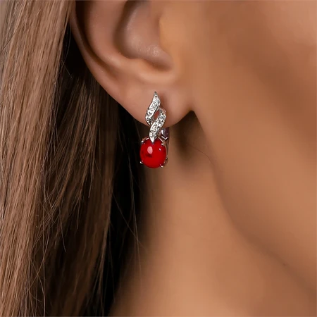 {{productViewItem.photos[photoViewList.activeNavIndex].Alt || productViewItem.photos[photoViewList.activeNavIndex].Description || 'Серьги из серебра с кораллом и цирконом'}}