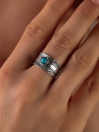 {{productViewItem.photos[photoViewList.activeNavIndex].Alt || productViewItem.photos[photoViewList.activeNavIndex].Description || 'Кольцо из серебра с бирюзой в этно стиле'}}