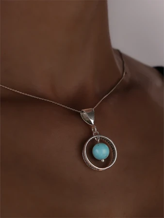 {{productViewItem.photos[photoViewList.activeNavIndex].Alt || productViewItem.photos[photoViewList.activeNavIndex].Description || 'Подвеска из серебра с бирюзой'}}