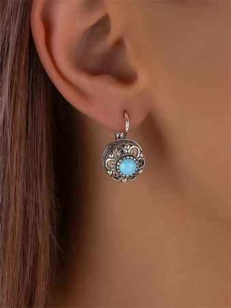 {{productViewItem.photos[photoViewList.activeNavIndex].Alt || productViewItem.photos[photoViewList.activeNavIndex].Description || 'Серьги из серебра с бирюзой'}}