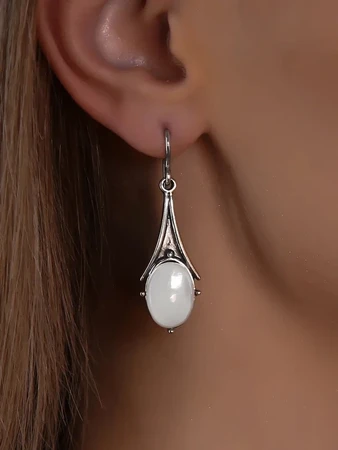 {{productViewItem.photos[photoViewList.activeNavIndex].Alt || productViewItem.photos[photoViewList.activeNavIndex].Description || 'Серьги из серебра с перламутром'}}