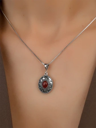 {{productViewItem.photos[photoViewList.activeNavIndex].Alt || productViewItem.photos[photoViewList.activeNavIndex].Description || 'Подвеска из серебра с сердоликом'}}