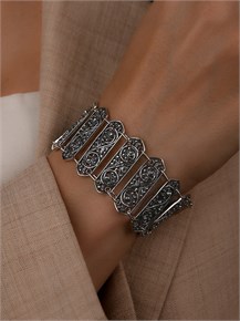 {{photo.Alt || photo.Description || 'Браслет из серебра с филигранью'}}