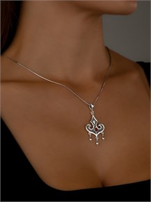 {{photo.Alt || photo.Description || 'Кулон из серебра с сердоликом'}}