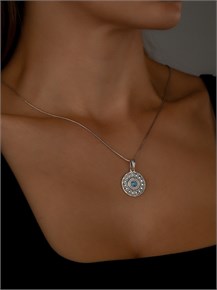 {{photo.Alt || photo.Description || 'Кулон из серебра с бирюзой'}}